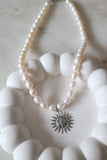COLLIER • WHITE •
