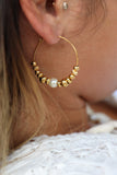 BOUCLES D'OREILLES • PORT •