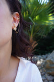 BOUCLE D'OREILLE • DÉCISION •