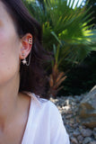 BOUCLE D'OREILLE • DÉCISION •