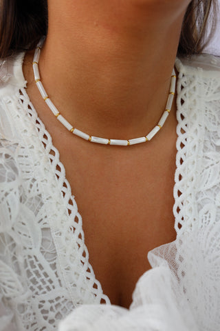 COLLIER • NU-PIED •
