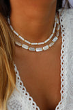 COLLIER • NU-PIED •