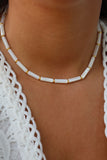 COLLIER • NU-PIED •